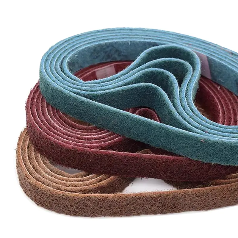 This is a picture of Nylon Coarse Medium Fine Surface 3m Sanding Belt 10X330 Sanding Belt For Metal Grinding Polishing Surface Abrasives